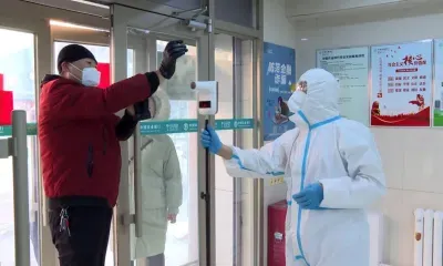 Добровольно сообщившие о симптомах коронавируса жители Китая могли получить 10 тысяч юаней