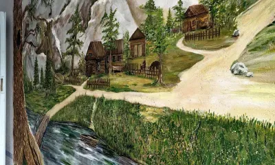 Стена в подъезде стала холстом для главы Тындинского округа